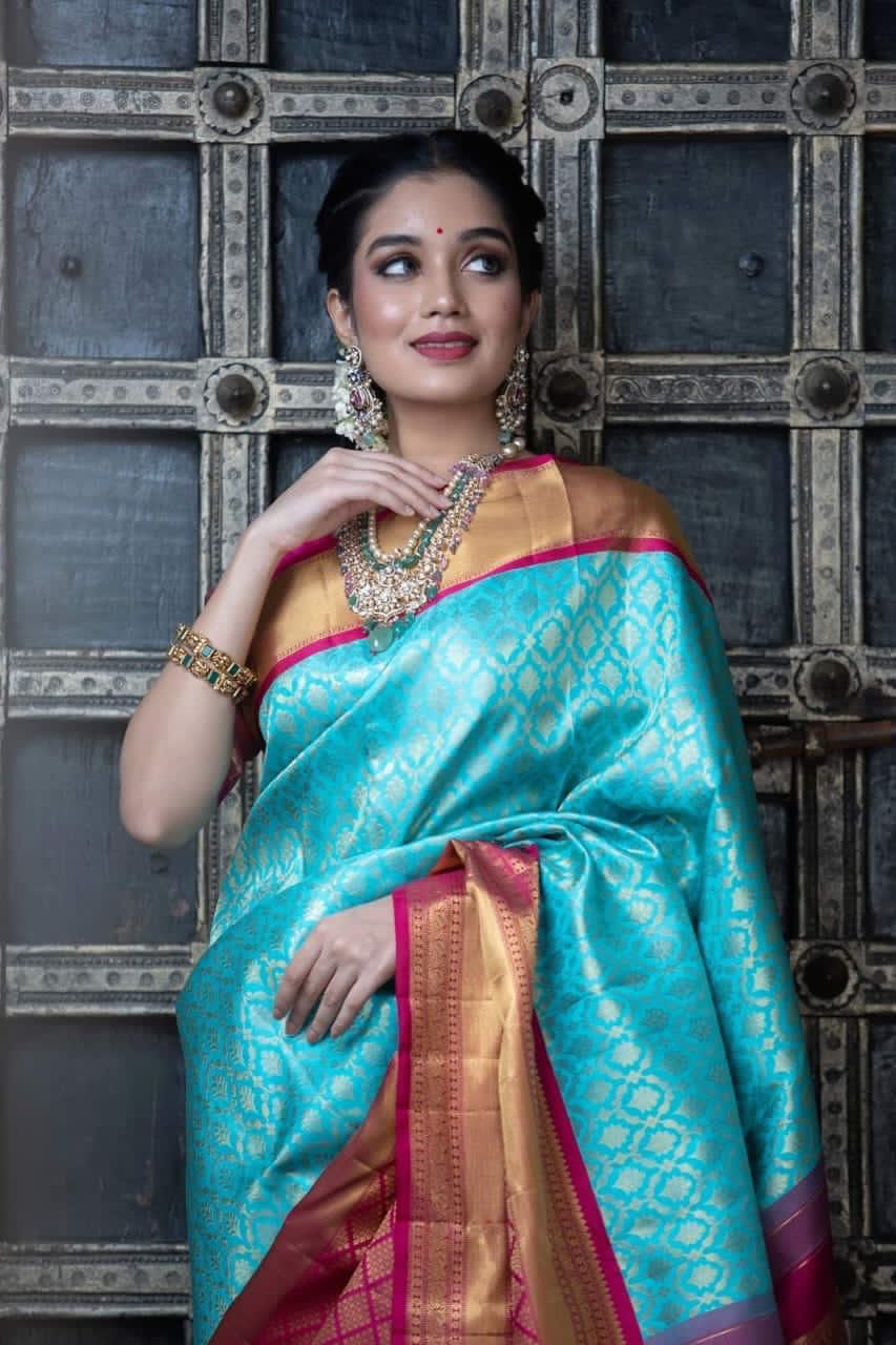 Elegant Turquoise Silk Saree with Contrast Pink Border