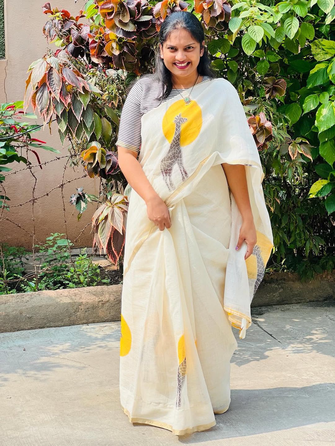 Golden Giraffe Elegance Linen Cotton Saree with Gold Zari Weaving Patti & Artistic Giraffe Digital Print