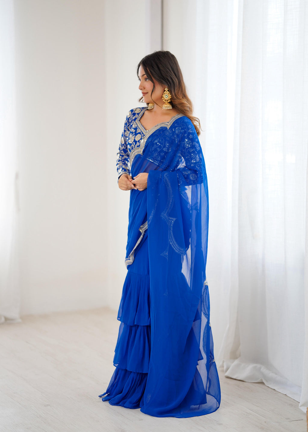 Faux Georgette Ruffle Saree with Thread & Sequin Embroidered Blouse