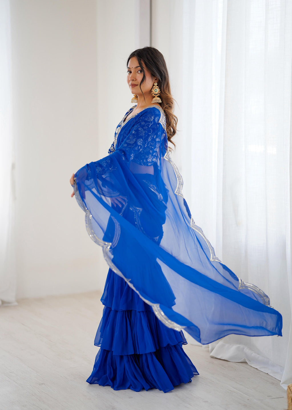 Faux Georgette Ruffle Saree with Thread & Sequin Embroidered Blouse