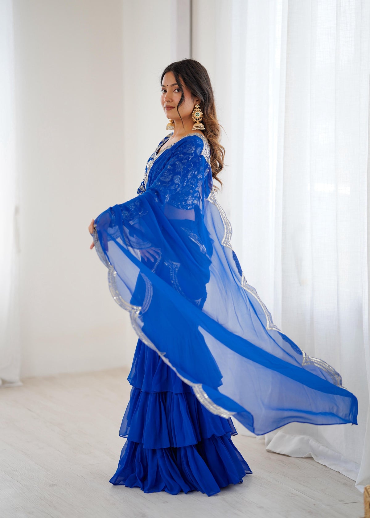 Faux Georgette Ruffle Saree with Thread & Sequin Embroidered Blouse