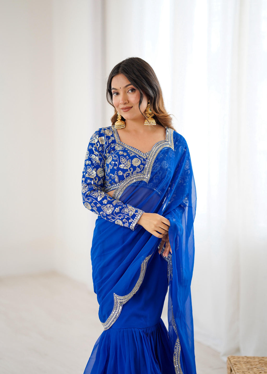 Faux Georgette Ruffle Saree with Thread & Sequin Embroidered Blouse